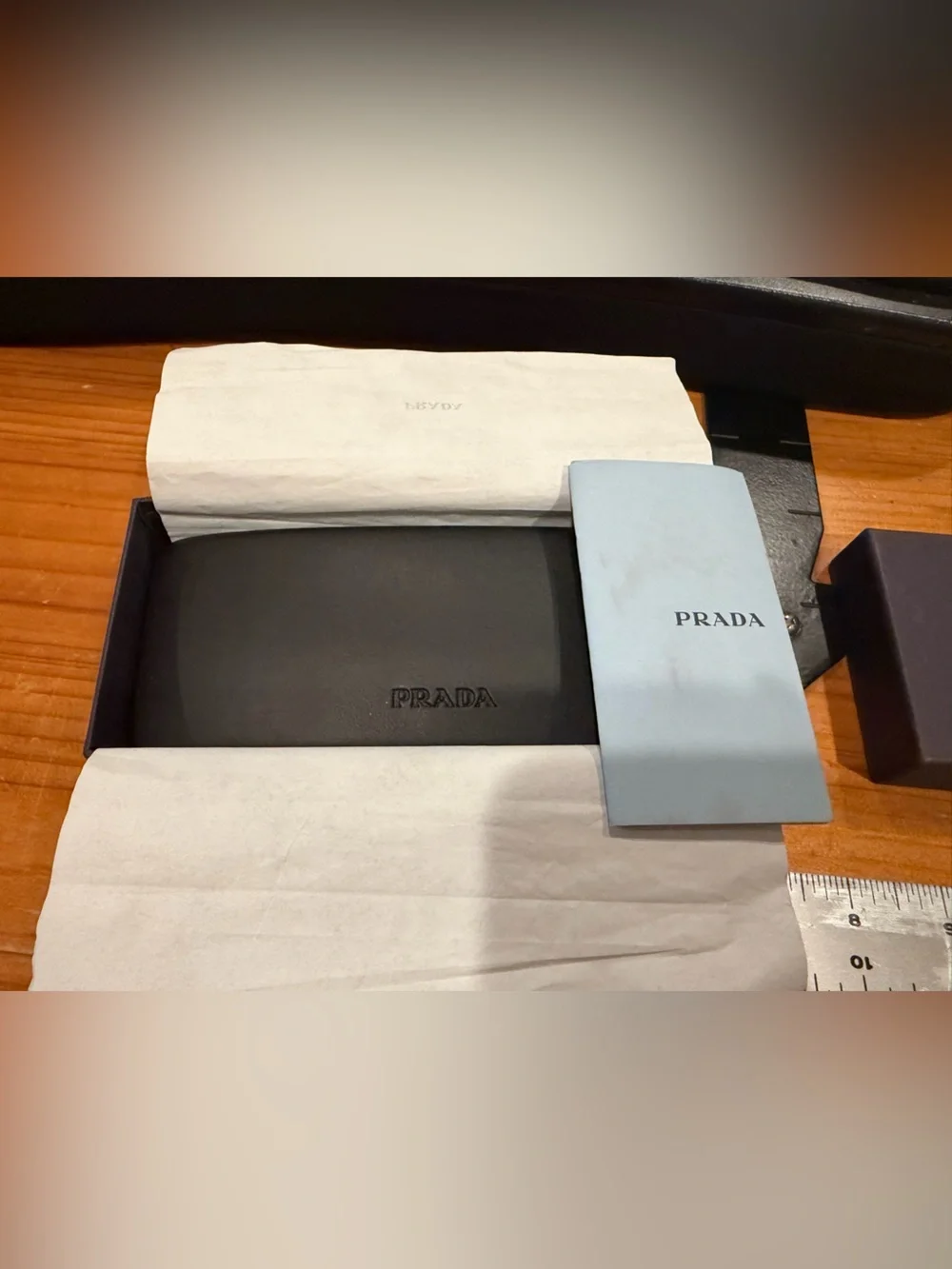 Prada Kids Oval Sunglasses in Light Gray with Dark Lenses